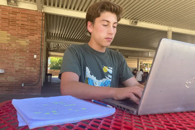 Sophomore JP Ramirez crafting an email to a teacher 